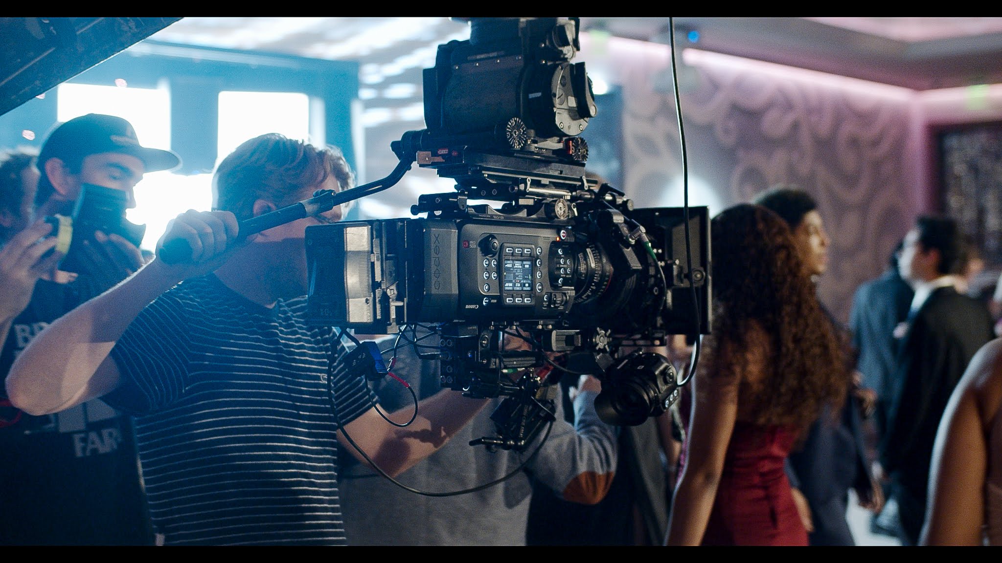 Camera rig filming a crowded scene